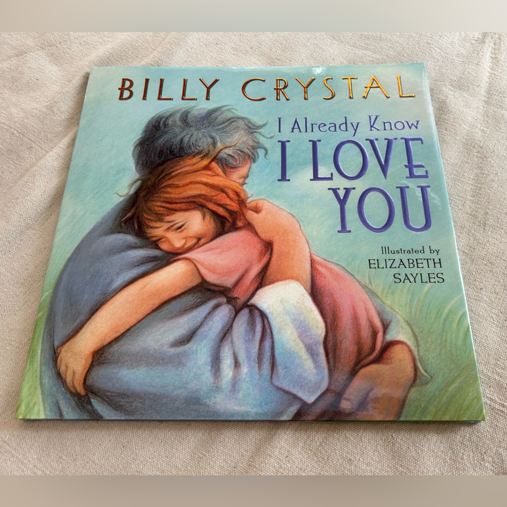 Billy Crystal’s “I Already Know I Love You” book to his unborn grandchild. Hrdbk